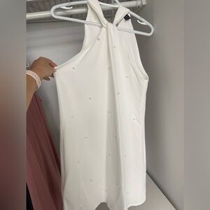 White halter dress with pearls